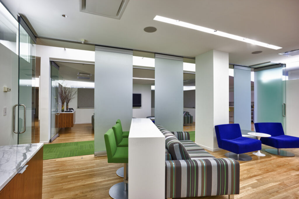 Luminous Ava, non-acoustic glass wall with frosted glass finish, individual panels, offset stack